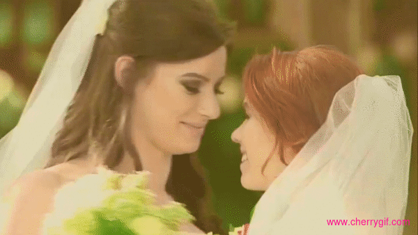 Romantic lesbian wedding kiss Gif